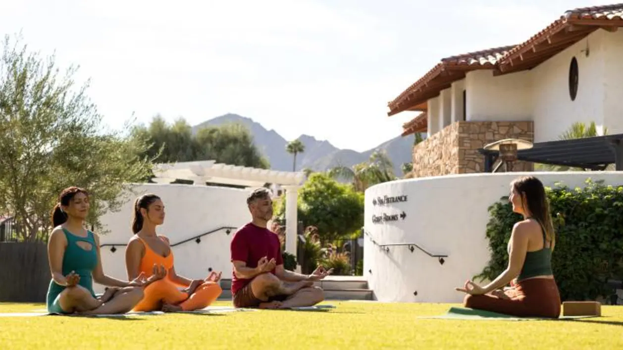 Lawn yoga at Tommy Bahama Miramonte